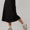 Neo Noir Bovary Skirt - Eleganter Midirock in Schwarz 1 Neo Noir Bovary Skirt - Eleganter Midirock in Schwarz -Teveo Geschaft 238030 1