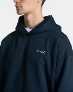 Arrival Hoodie Dunkelblau - Stylischer Oversized Kapuzenpullover für Gym & Alltag -Teveo Geschaft Arrival Hoodie Dunkelblau 6486