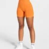 High-Waisted Orange Fitness Shorts - Seamless Booty Lifting Performance Wear