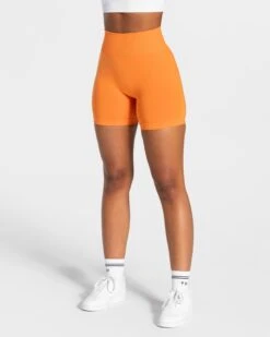 High-Waisted Orange Fitness Shorts - Seamless Booty Lifting Performance Wear