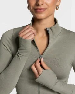 Femme Shaping Zip Jacke in Khaki – Figurbetonte Sportjacke mit Stehkragen -Teveo Geschaft Femme Shaping Zip Jacke Khaki 7190