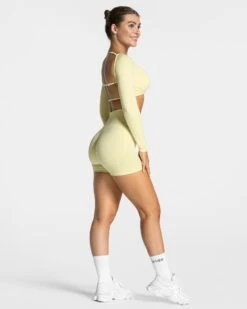 TEVEO Femme Backless Longsleeve Gelb - Rückenfreies Damen Fitness Crop Top 11 TEVEO Femme Backless Longsleeve Gelb - Rückenfreies Damen Fitness Crop Top -Teveo Geschaft Femme Short Gelb 7067