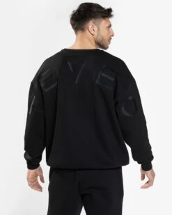 TEVEO Arrival Signature Sweater - Schwarz Oversized Strick-Pullover