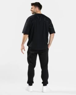TEVEO Arrival Signature T-Shirt in Schwarz – Oversized Gym Style 11 TEVEO Arrival Signature T-Shirt in Schwarz – Oversized Gym Style -Teveo Geschaft Signature T Shirt Schwarz 5079