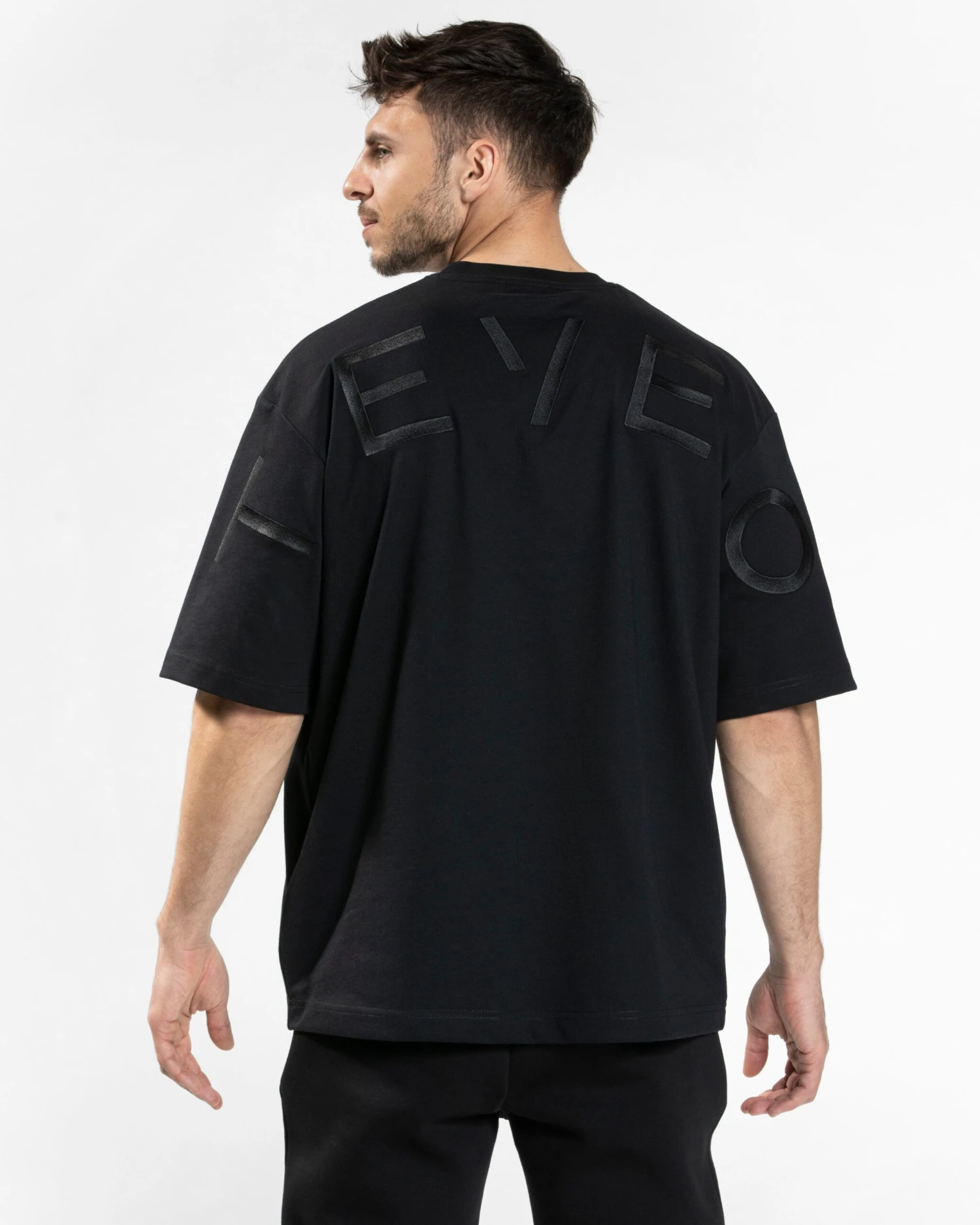 TEVEO Arrival Signature T-Shirt in Schwarz – Oversized Gym Style 3 TEVEO Arrival Signature T-Shirt in Schwarz – Oversized Gym Style