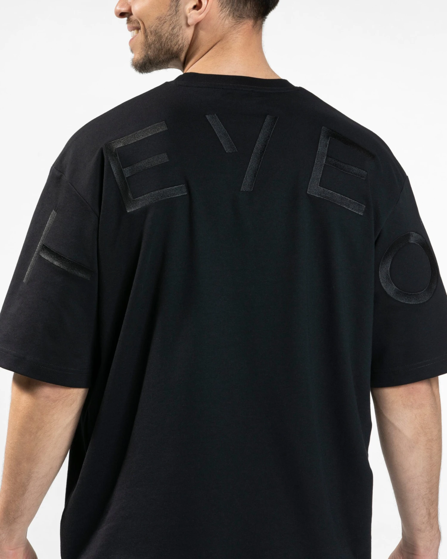 TEVEO Arrival Signature T-Shirt in Schwarz – Oversized Gym Style 6 TEVEO Arrival Signature T-Shirt in Schwarz – Oversized Gym Style – Bild 4