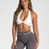 TEVEO Signature Twisted Sport-BH in Weiß – Stylischer Halt für dein Training