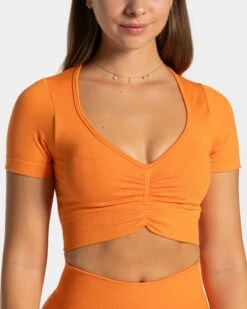 Focus Crop Top Orange – Damen Sport-Oberteil mit Support & V-Ausschnitt 10 Focus Crop Top Orange – Damen Sport-Oberteil mit Support & V-Ausschnitt -Teveo Geschaft TEVEO Focus Crop Top orange 1169