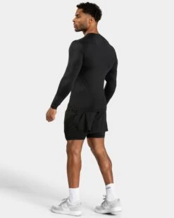 TEVEO Pace Half Tight Schwarz – Performance Trainingstight für Herren -Teveo Geschaft TEVEO Pace Longsleeve schwarz 1316 895a4c90 9bc8 4d41 ac52 e6a55e4a67a5